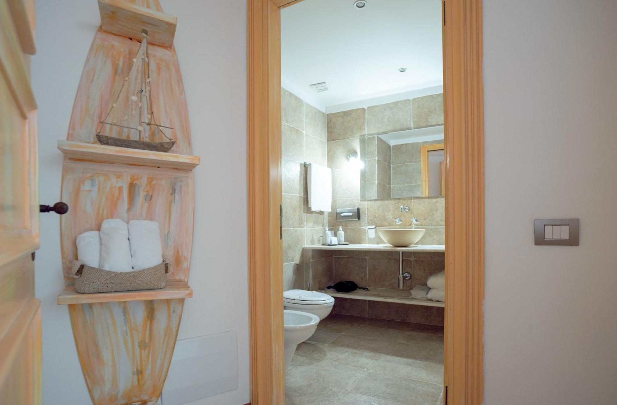 Hotel Cala Caterina Виласимиус Екстериор снимка